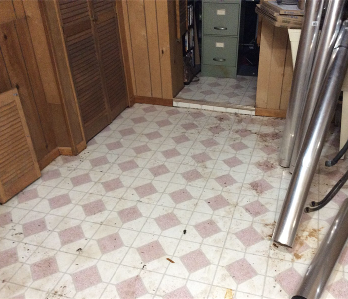 A damaged tile floor