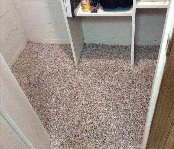 Dry carpet in closet